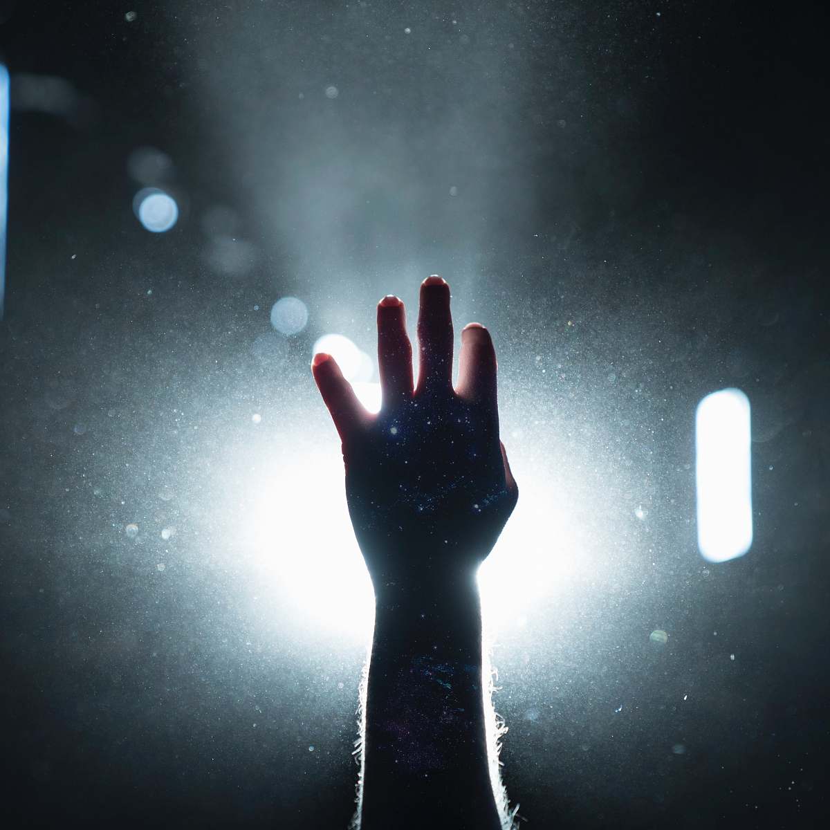 united states person's hand on light light